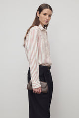 Curved Clutch in Leather