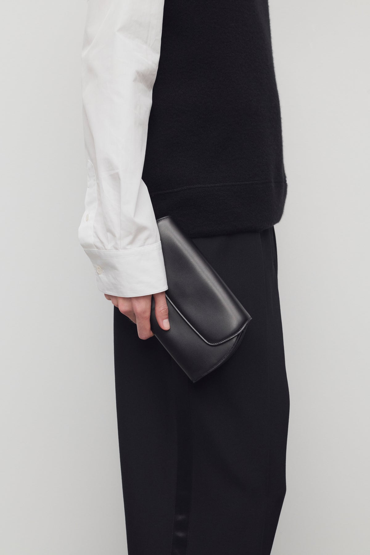 Curved Clutch in Leather