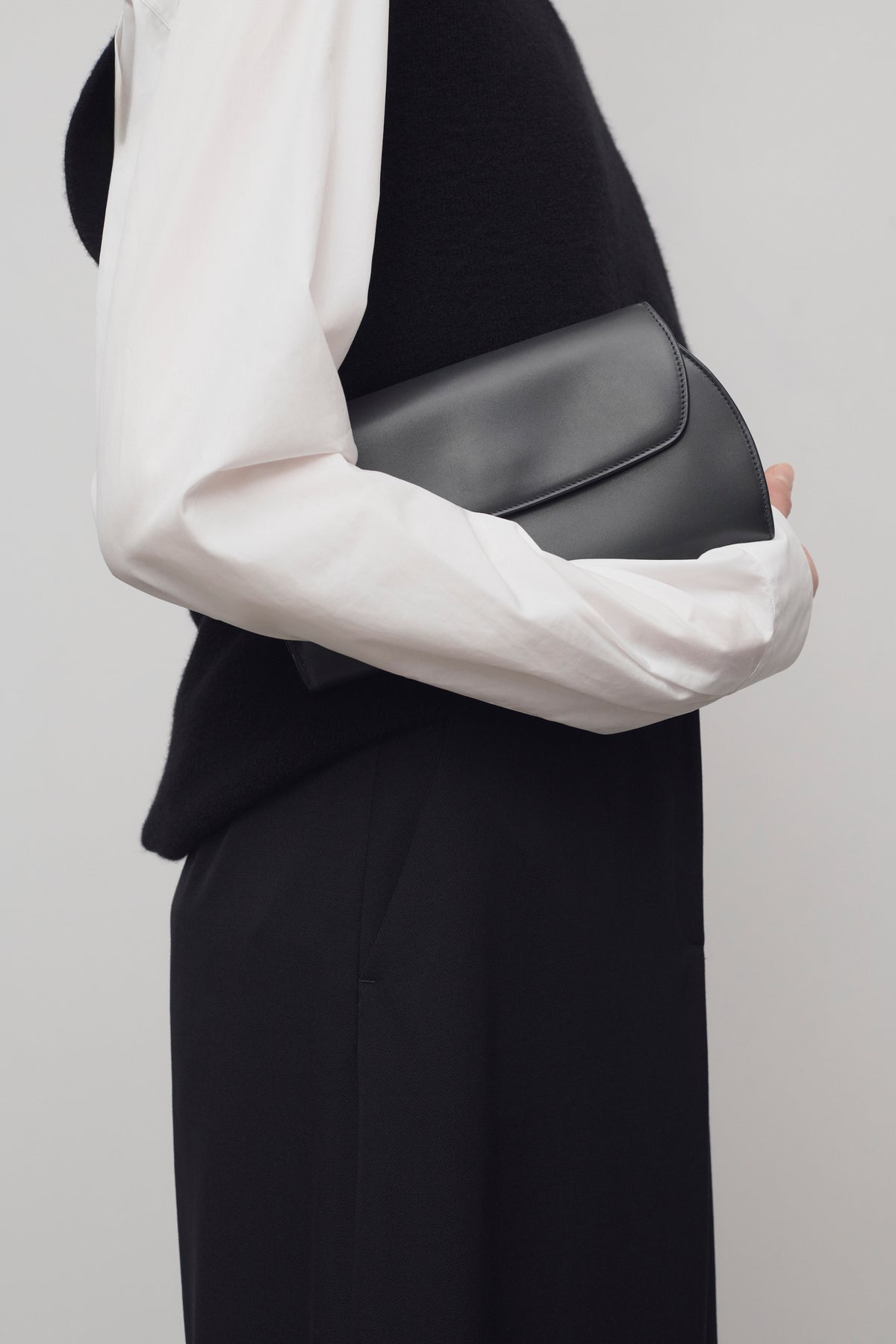 Curved Clutch in Leather
