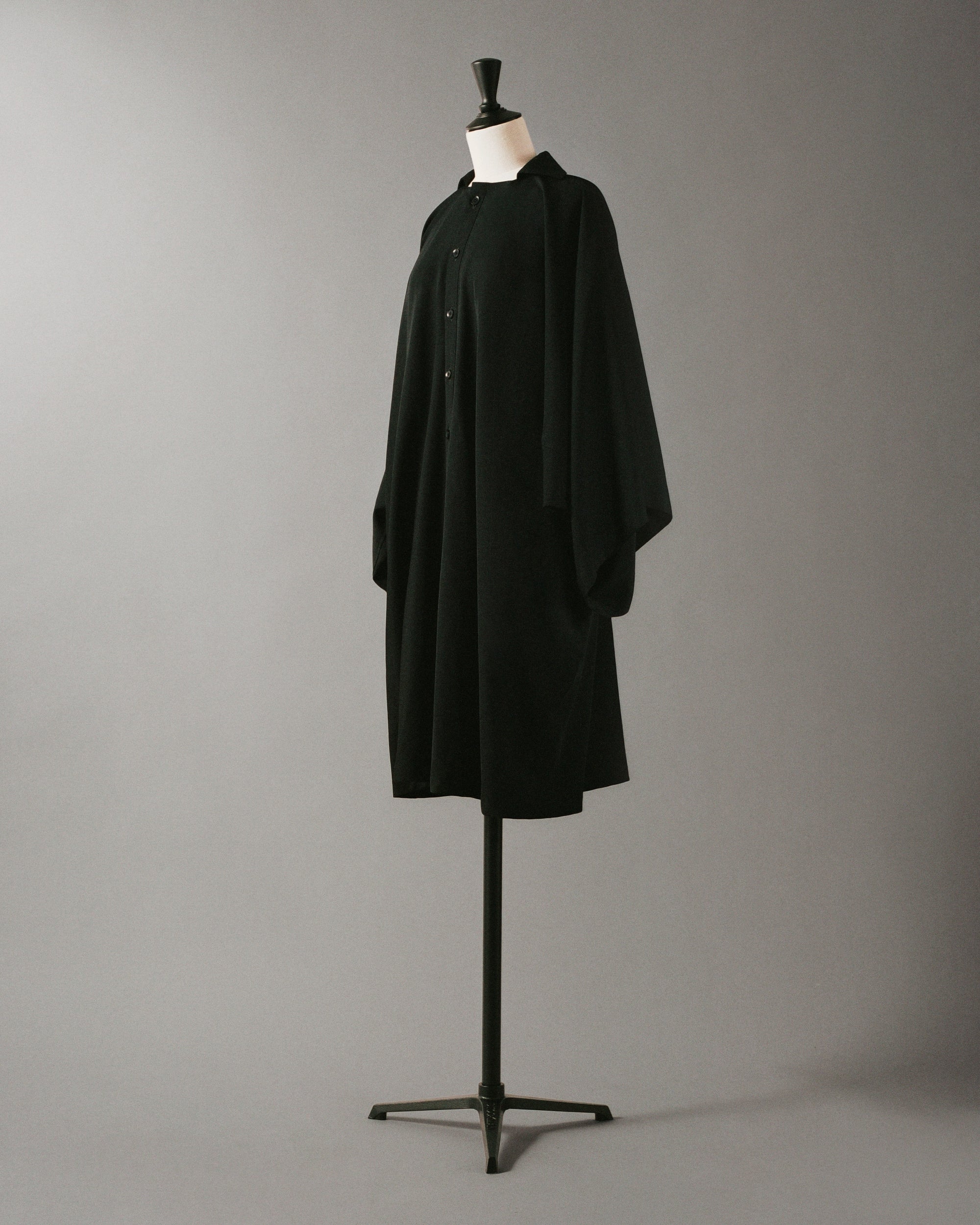 Buttoned Cloak, 1990